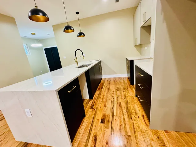 a view of empty room with a fireplace