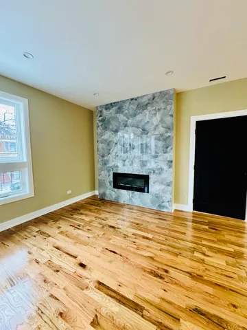 a view of a hallway with front door