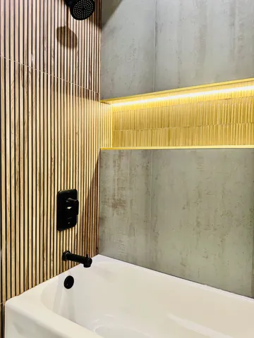 a view of a livingroom with wooden floor