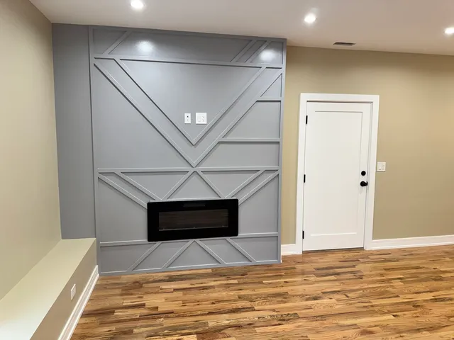 a view of a swimming pool with an outdoor seating