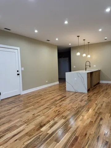 a view of a house with large windows