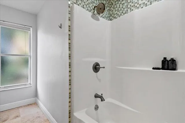 a bathroom with a bathtub