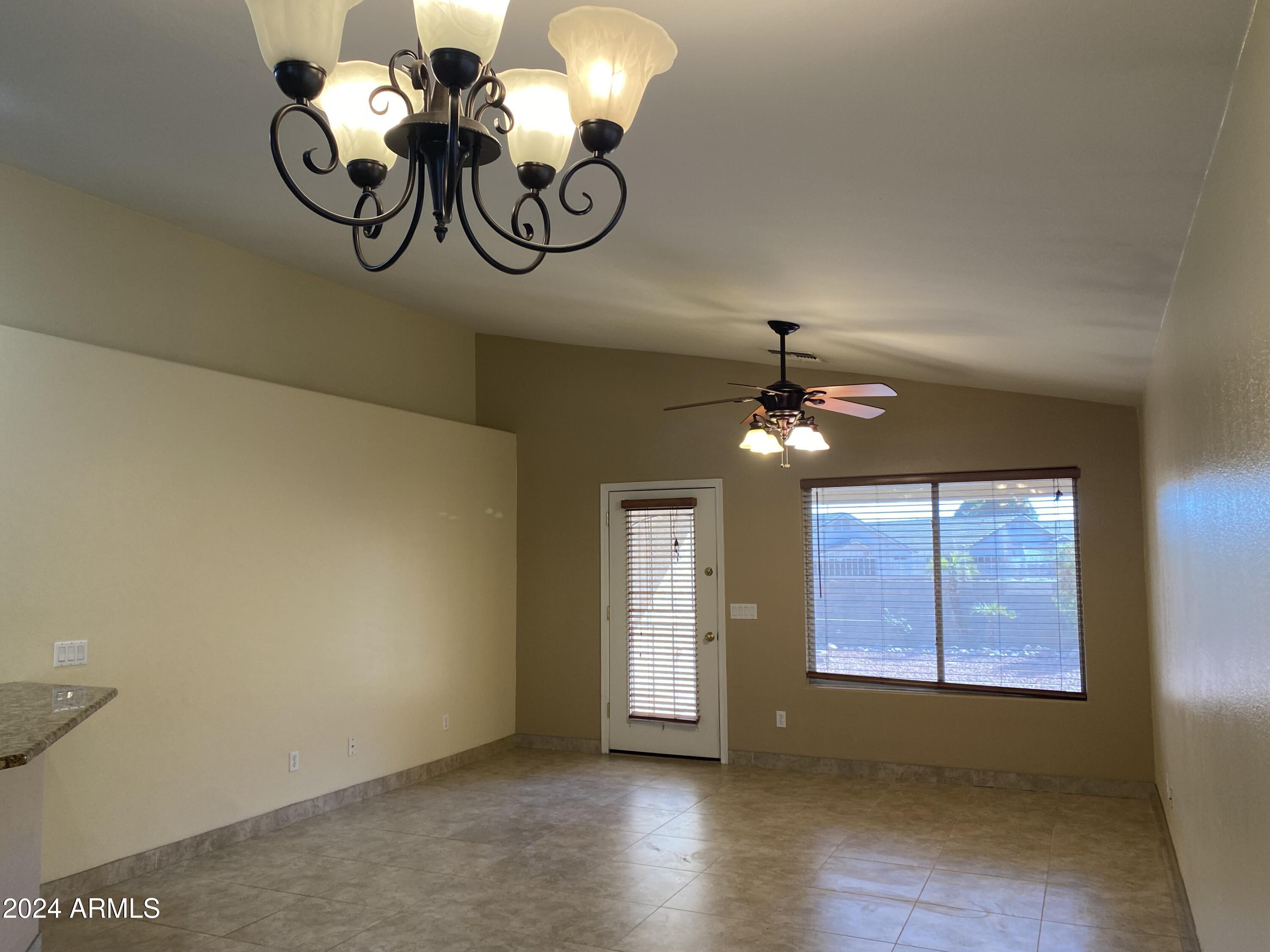 8143 West Marco Polo Road Peoria, AZ 85382 - Photo 11 of 29 a view of a livingroom with window