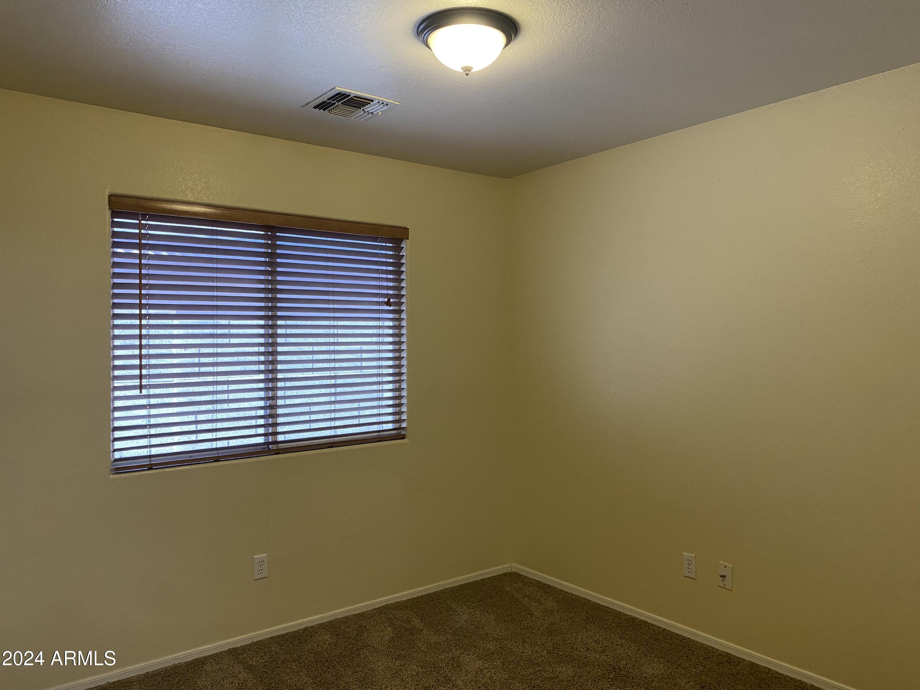 8143 West Marco Polo Road Peoria, AZ 85382 - Photo 19 of 29 a view of a room with a window