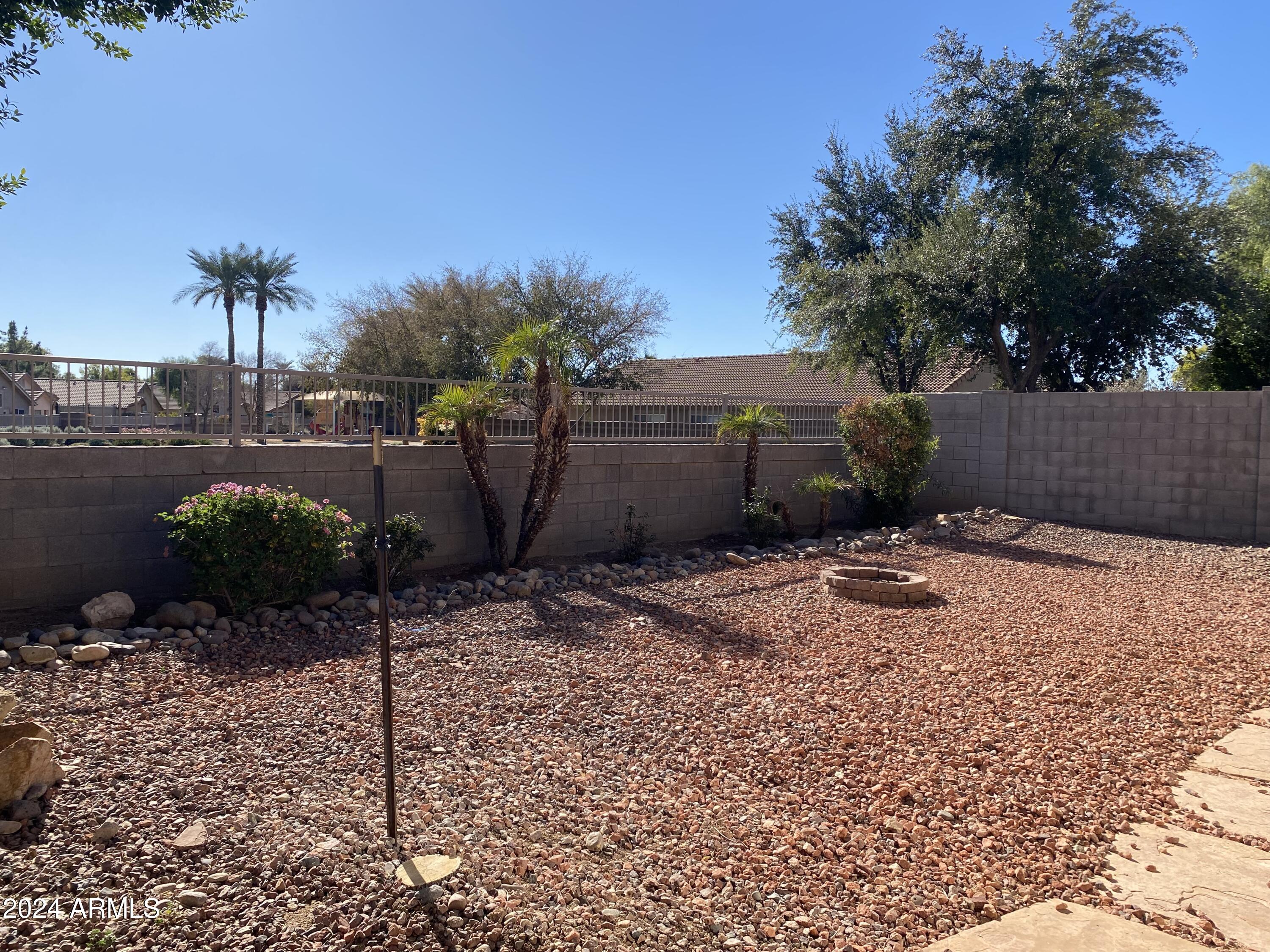 8143 West Marco Polo Road Peoria, AZ 85382 - Photo 28 of 29 a backyard of a house