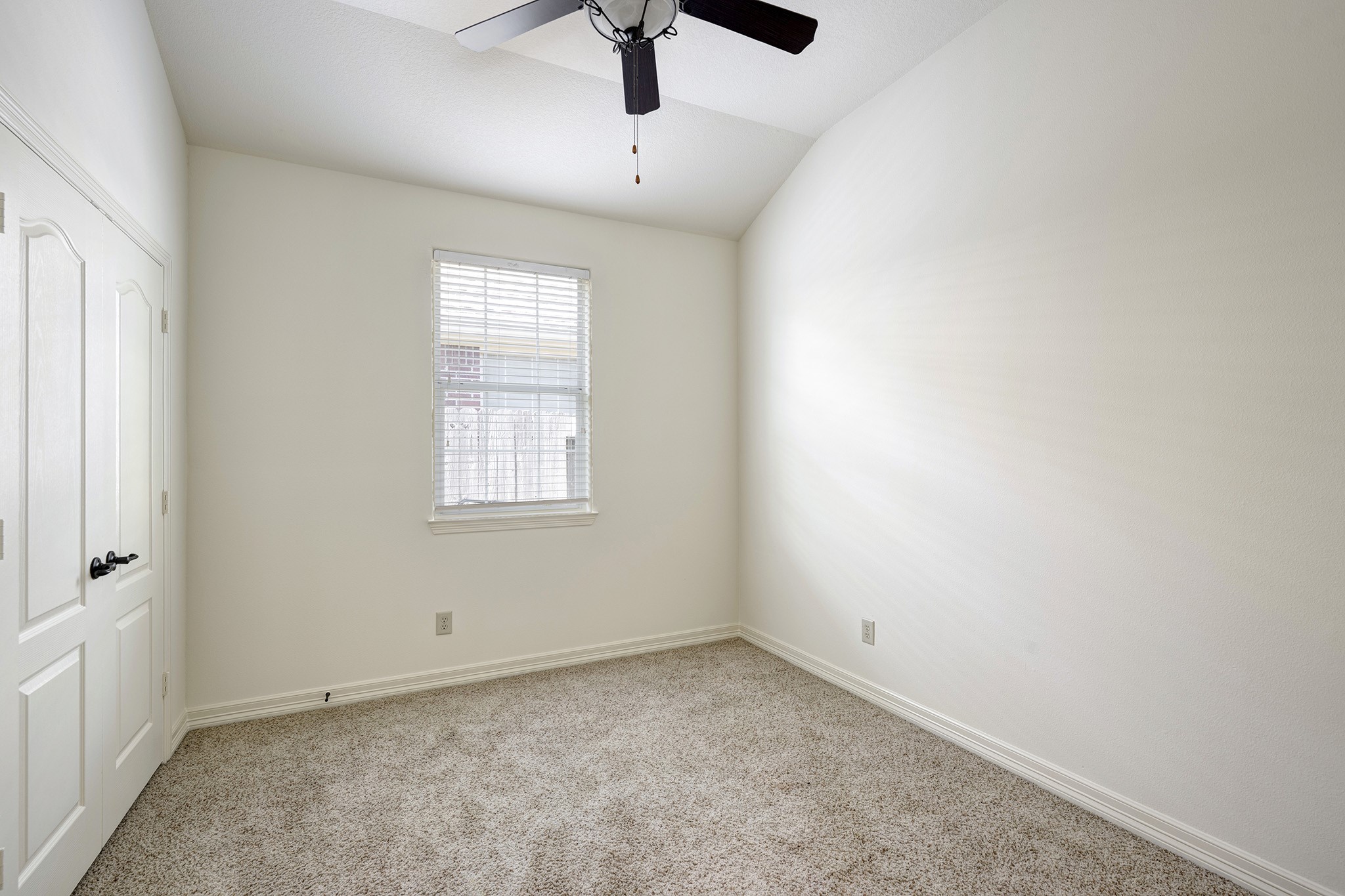 10348 Stone Gate Drive Conroe, TX 77385 - Photo 13 of 20 an empty room with a window