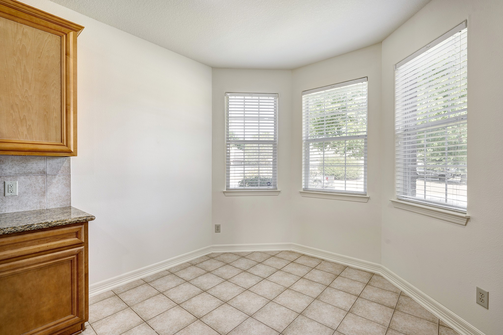 10348 Stone Gate Drive Conroe, TX 77385 - Photo 6 of 20 an empty room with windows