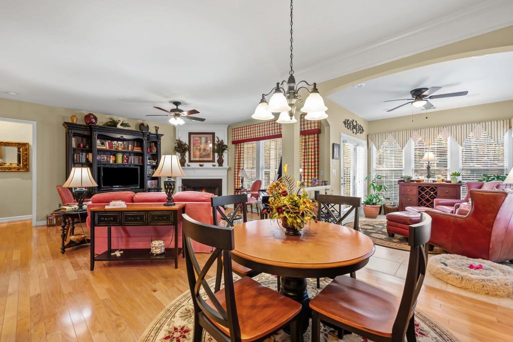 1081 Spring Station Road Greensboro, GA 30642 - Photo 14 of 35 a view of a dining room with furniture and chandelier