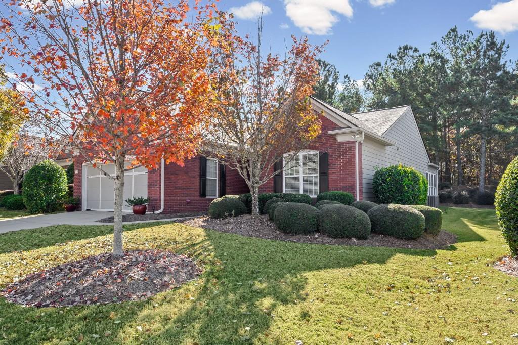 1081 Spring Station Road Greensboro, GA 30642 - Photo 2 of 35 a front view of a house with a yard