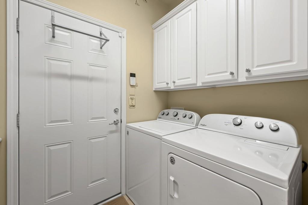 1081 Spring Station Road Greensboro, GA 30642 - Photo 28 of 35 a utility room with dryer and washer
