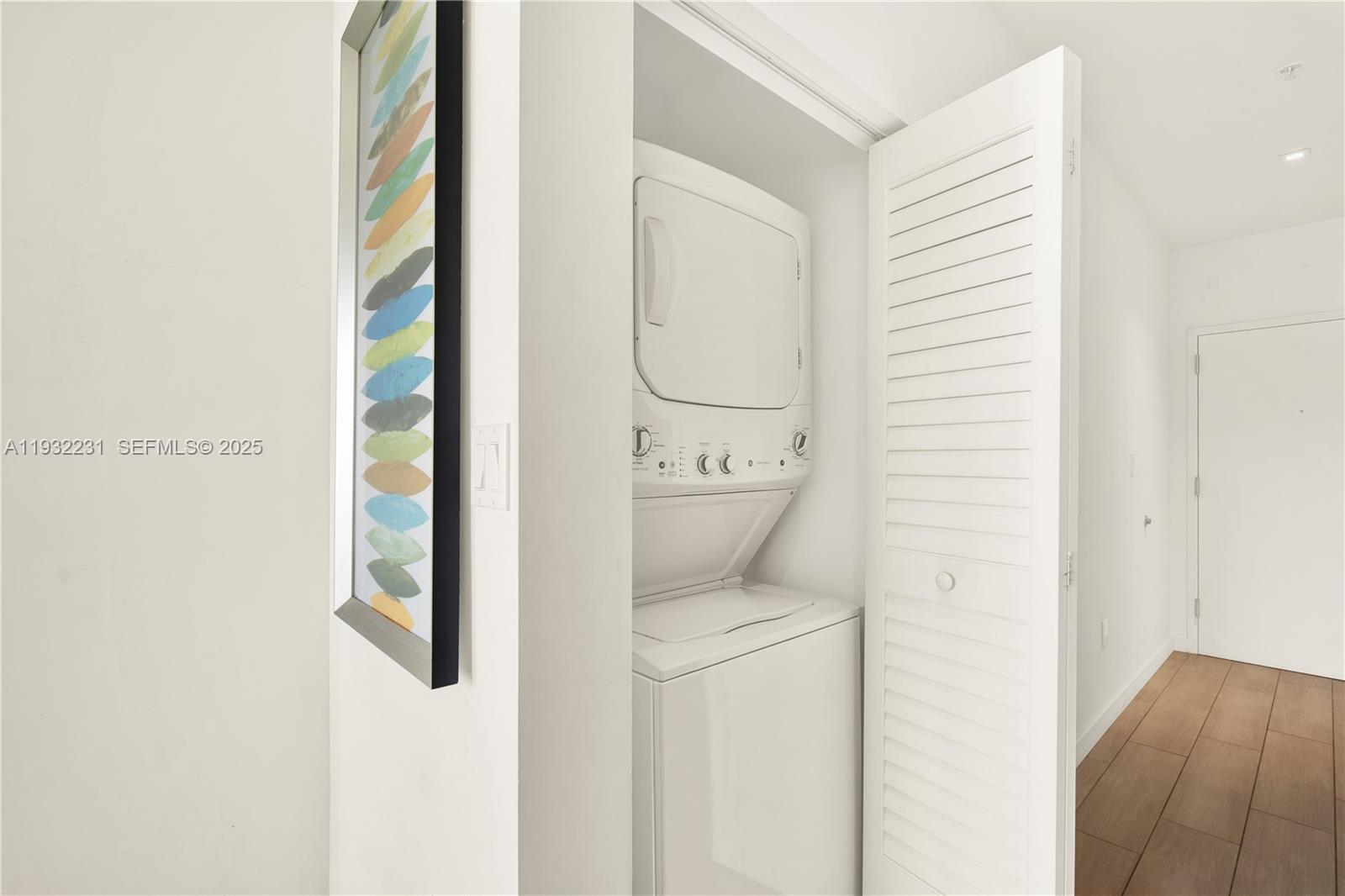 1600 Southwest 1st Avenue, Unit 804 Miami, FL 33129 - Photo 14 of 31 a utility room with dryer and washer