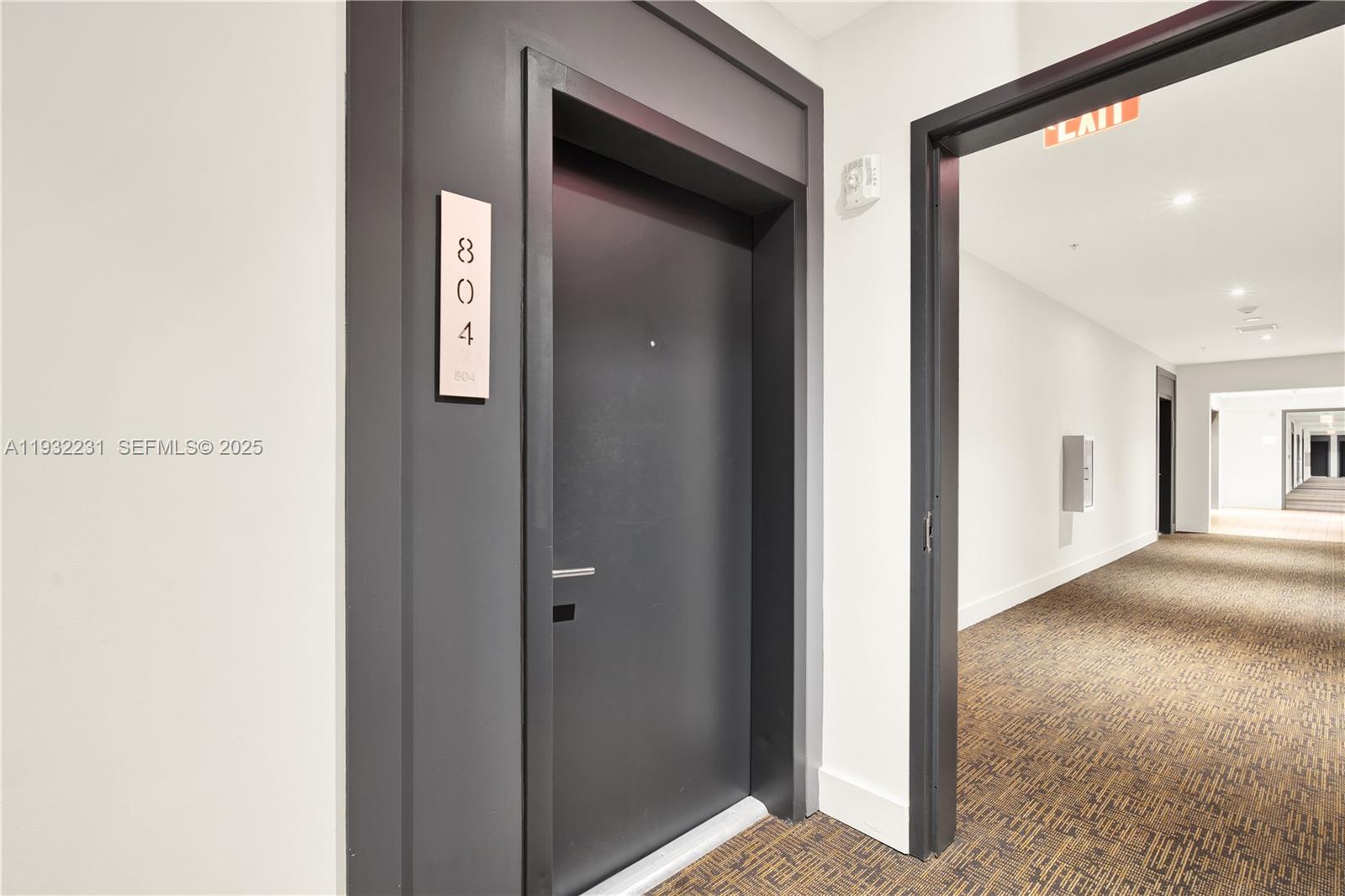 1600 Southwest 1st Avenue, Unit 804 Miami, FL 33129 - Photo 16 of 31 a view of a hallway with closet
