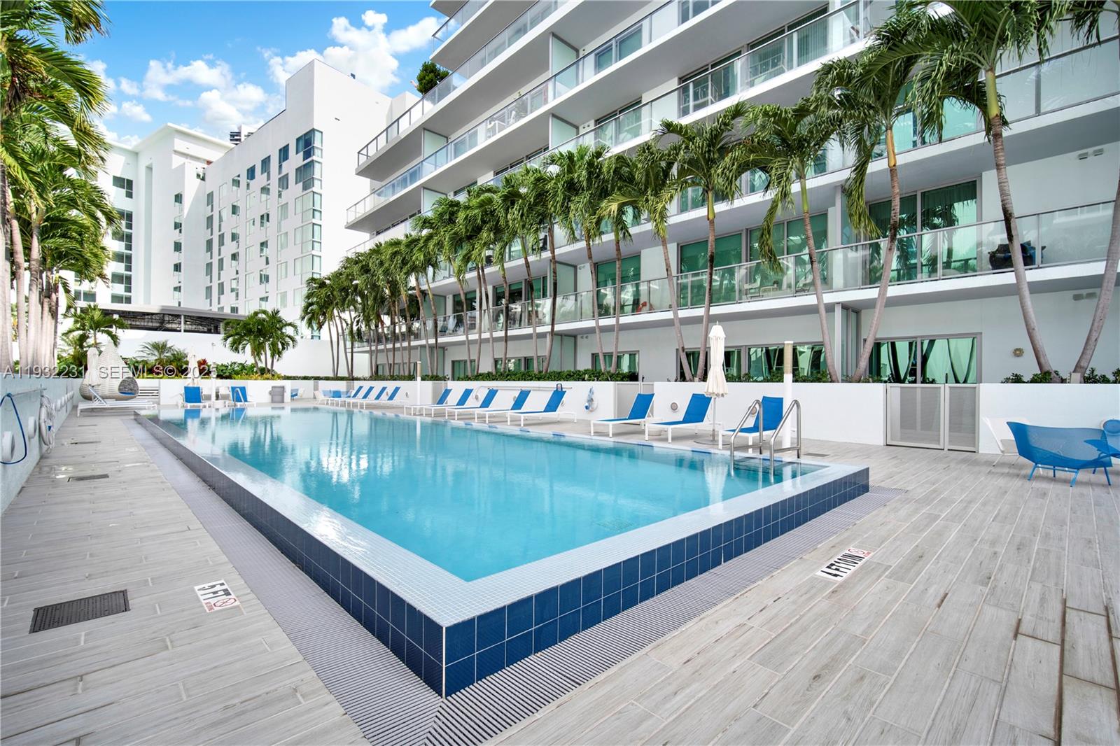 1600 Southwest 1st Avenue, Unit 804 Miami, FL 33129 - Photo 18 of 31 a view of a swimming pool with a patio