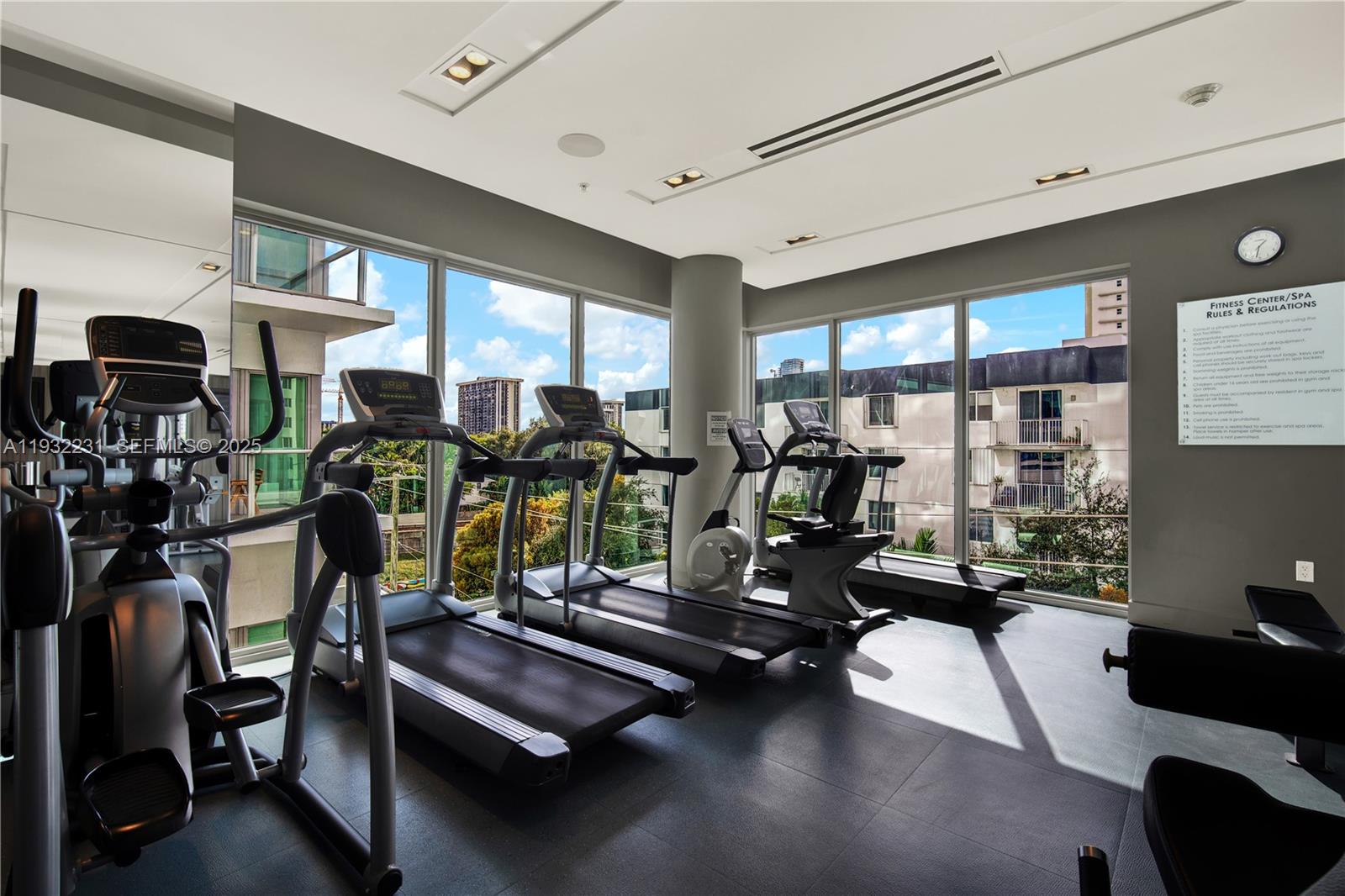 1600 Southwest 1st Avenue, Unit 804 Miami, FL 33129 - Photo 21 of 31 a view of a room with gym equipment