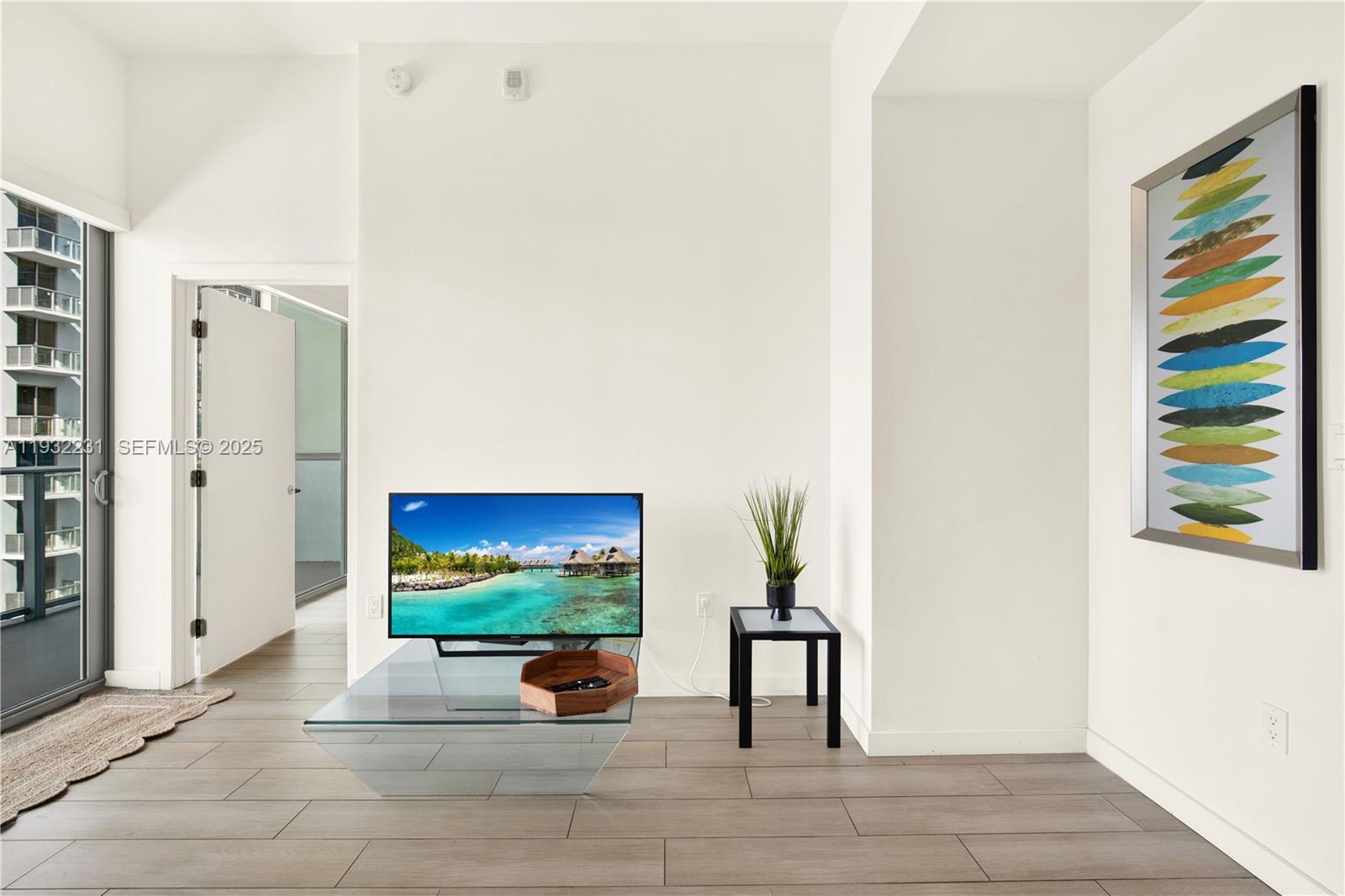 1600 Southwest 1st Avenue, Unit 804 Miami, FL 33129 - Photo 4 of 31 an outdoor space with patio furniture and potted plants