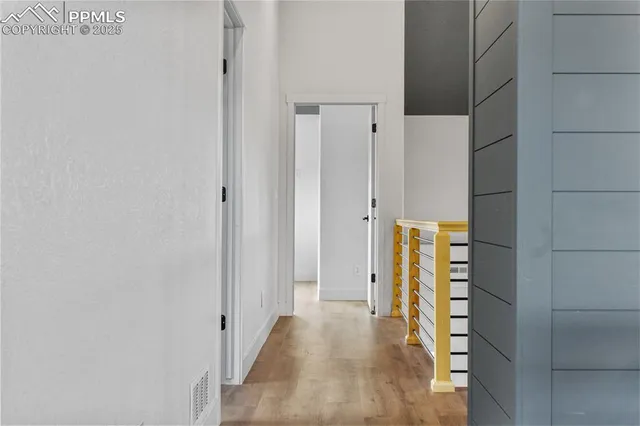 a view of hallway with stairs