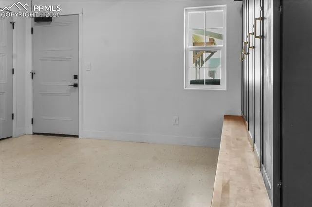 an empty room with windows