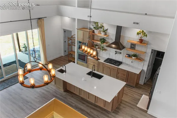 a room with furniture and a wooden floor