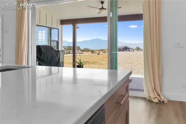 a view of a living room and dining room