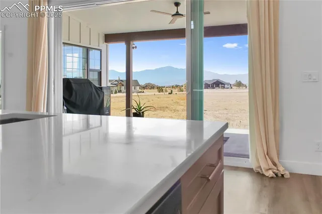 a view of a living room and dining room