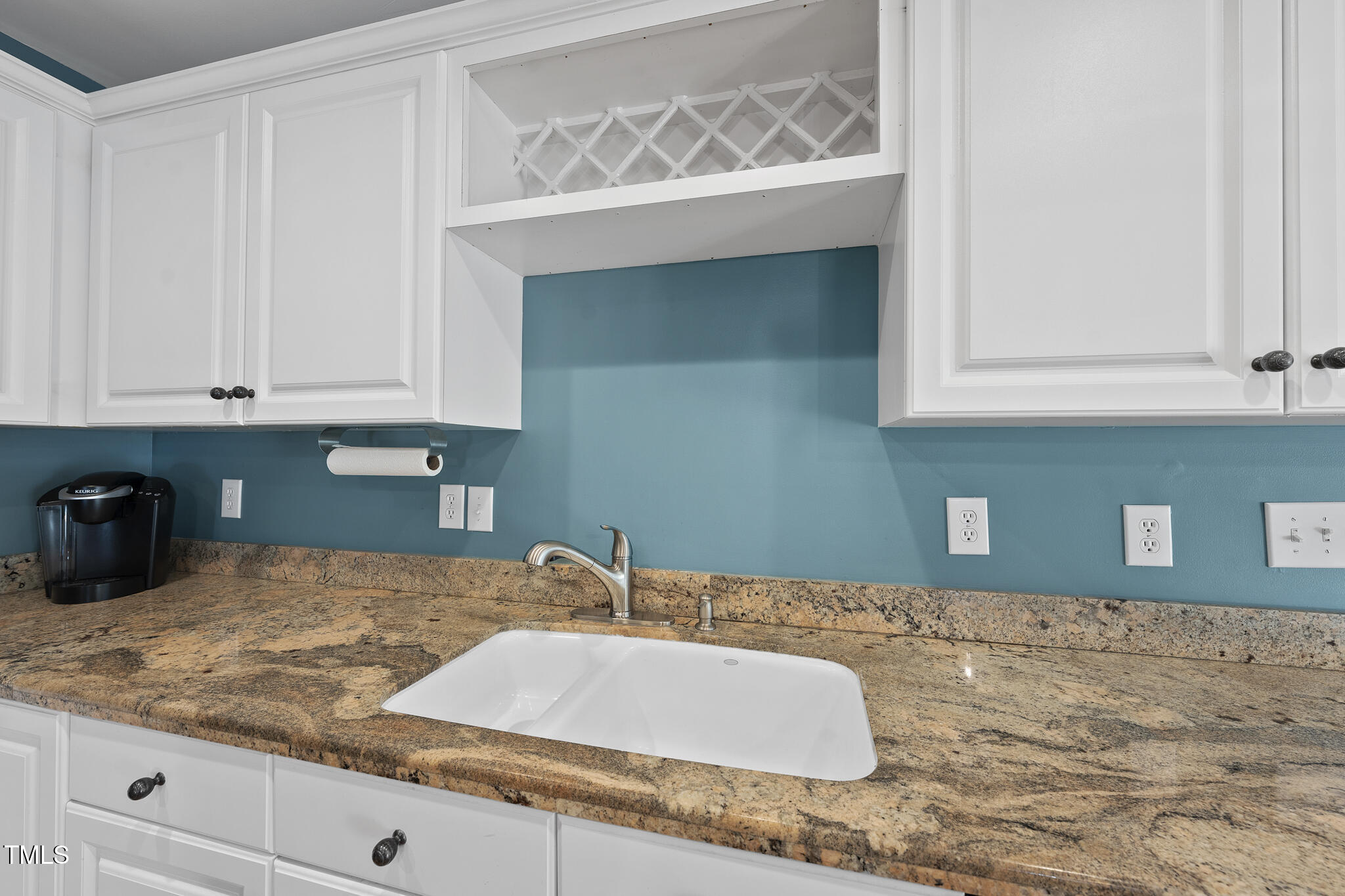8063 Hogan Drive Wake Forest, NC 27587 - Photo 19 of 46 a bathroom with a sink and a mirror
