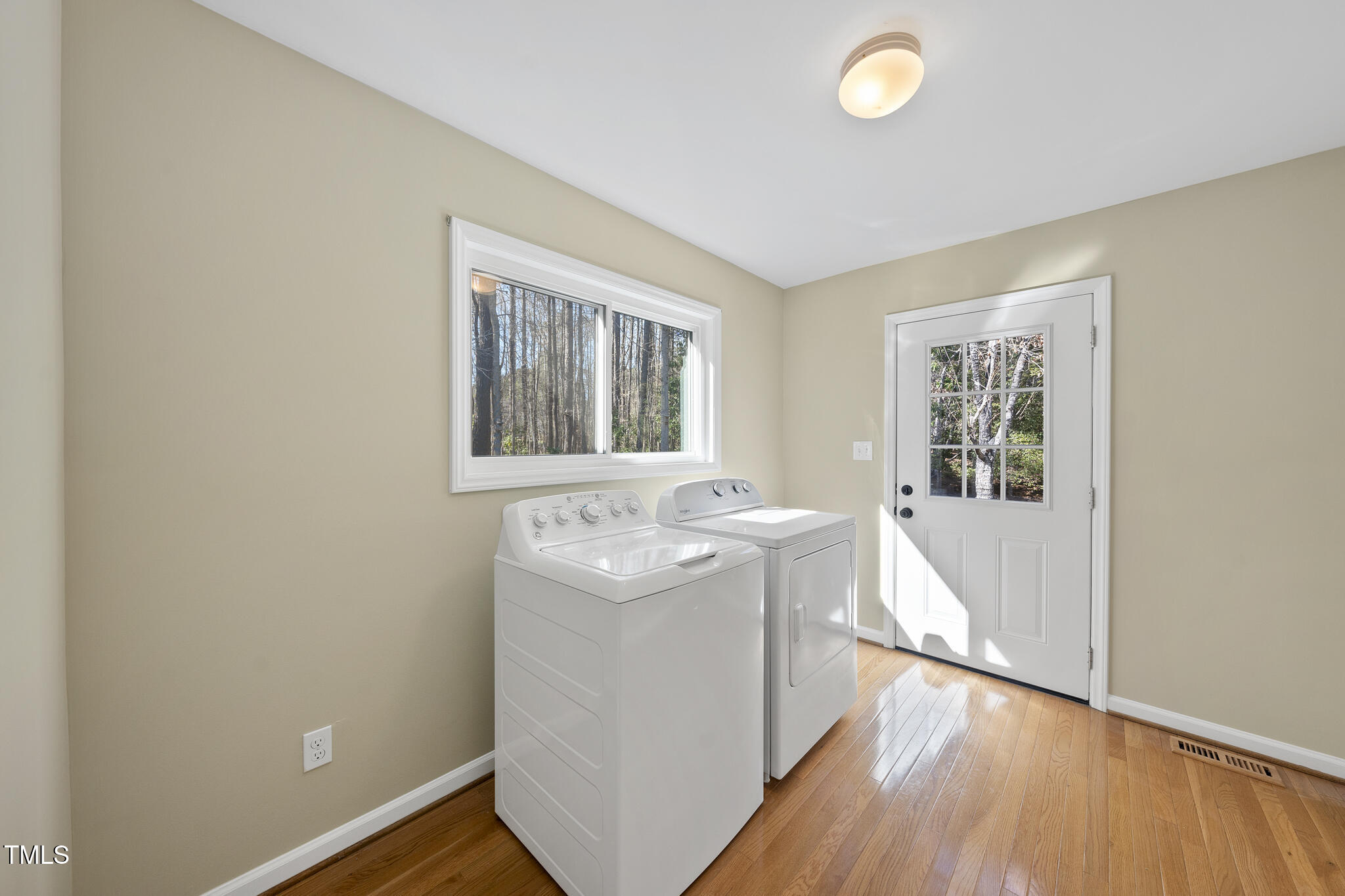 8063 Hogan Drive Wake Forest, NC 27587 - Photo 32 of 46 a view of a bathroom with wooden floor and window