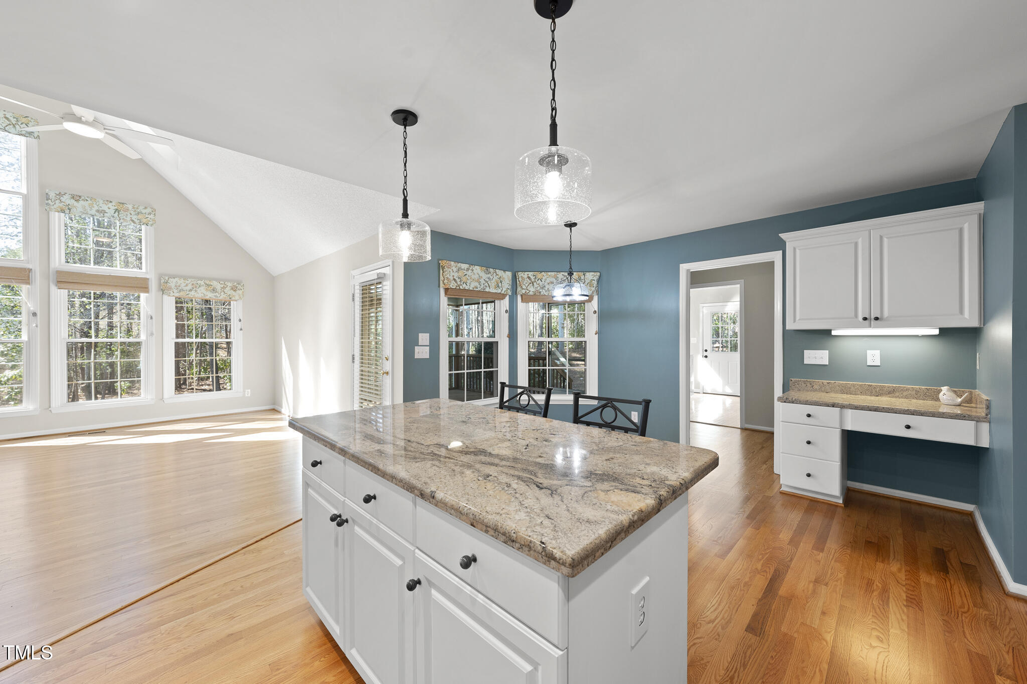 8063 Hogan Drive Wake Forest, NC 27587 - Photo 4 of 46 a bathroom with a granite countertop sink window and refrigerator