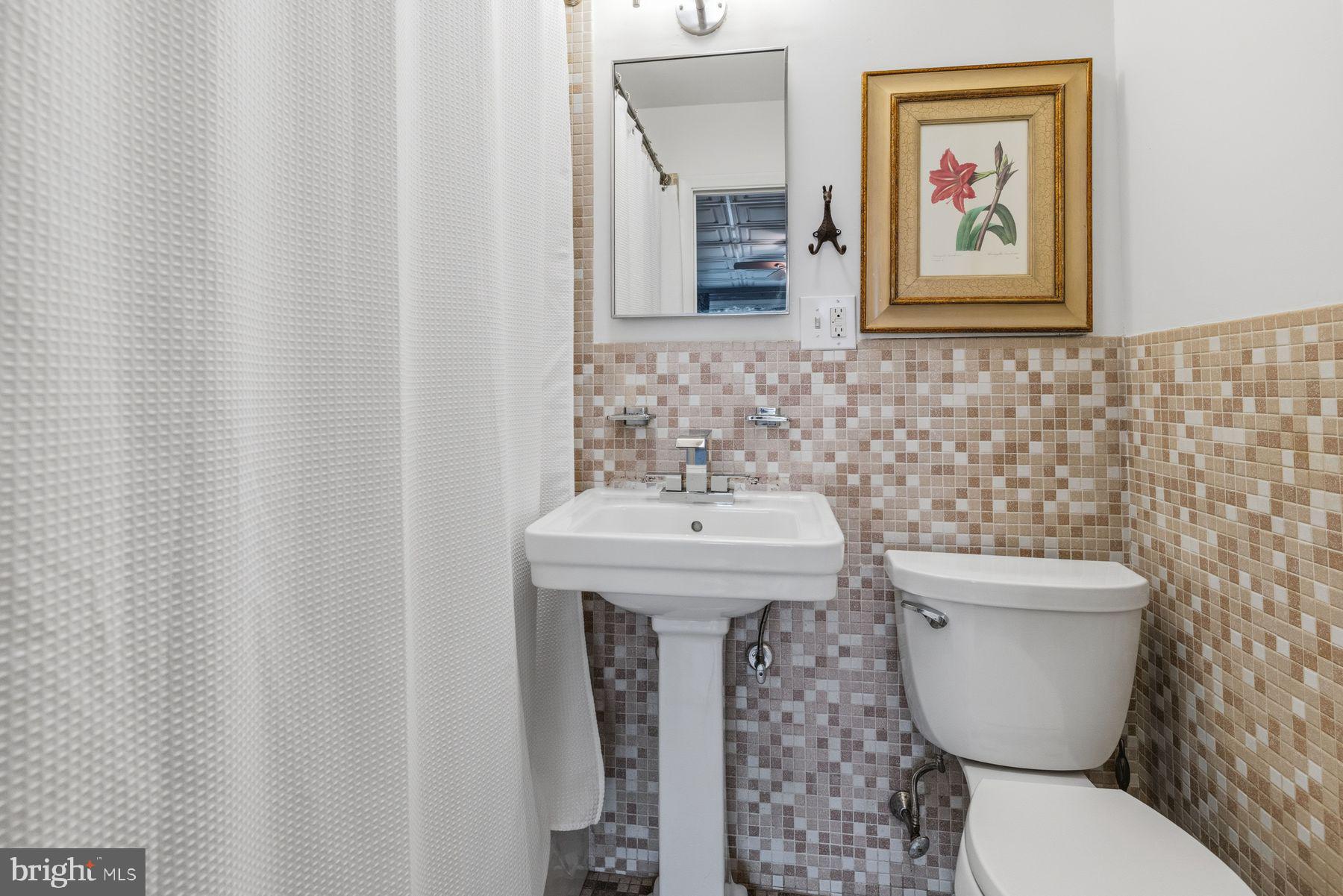 6254 West Valley Green Road Flourtown, PA 19031 - Photo 13 of 20 Charming bathroom with mosaic accents.