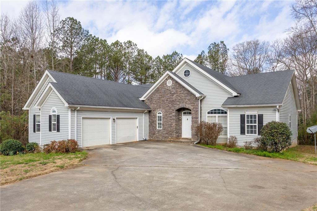 7387 Milam Road Winston, GA 30187 - Photo 6 of 41 front view of a house with a yard