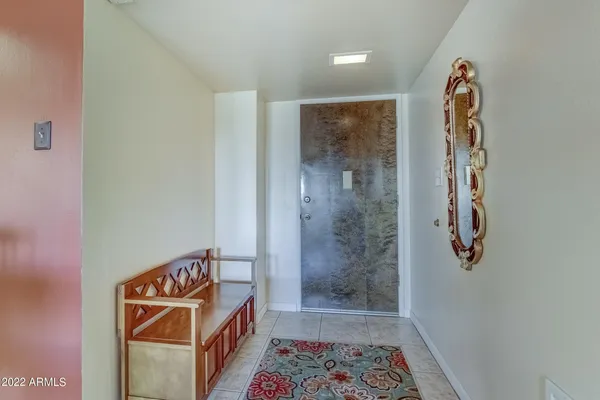 a view of room with window and bathroom