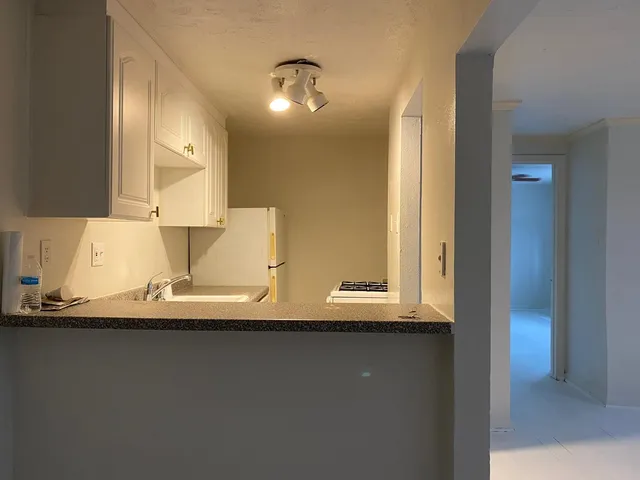 a view of a sink and a mirror