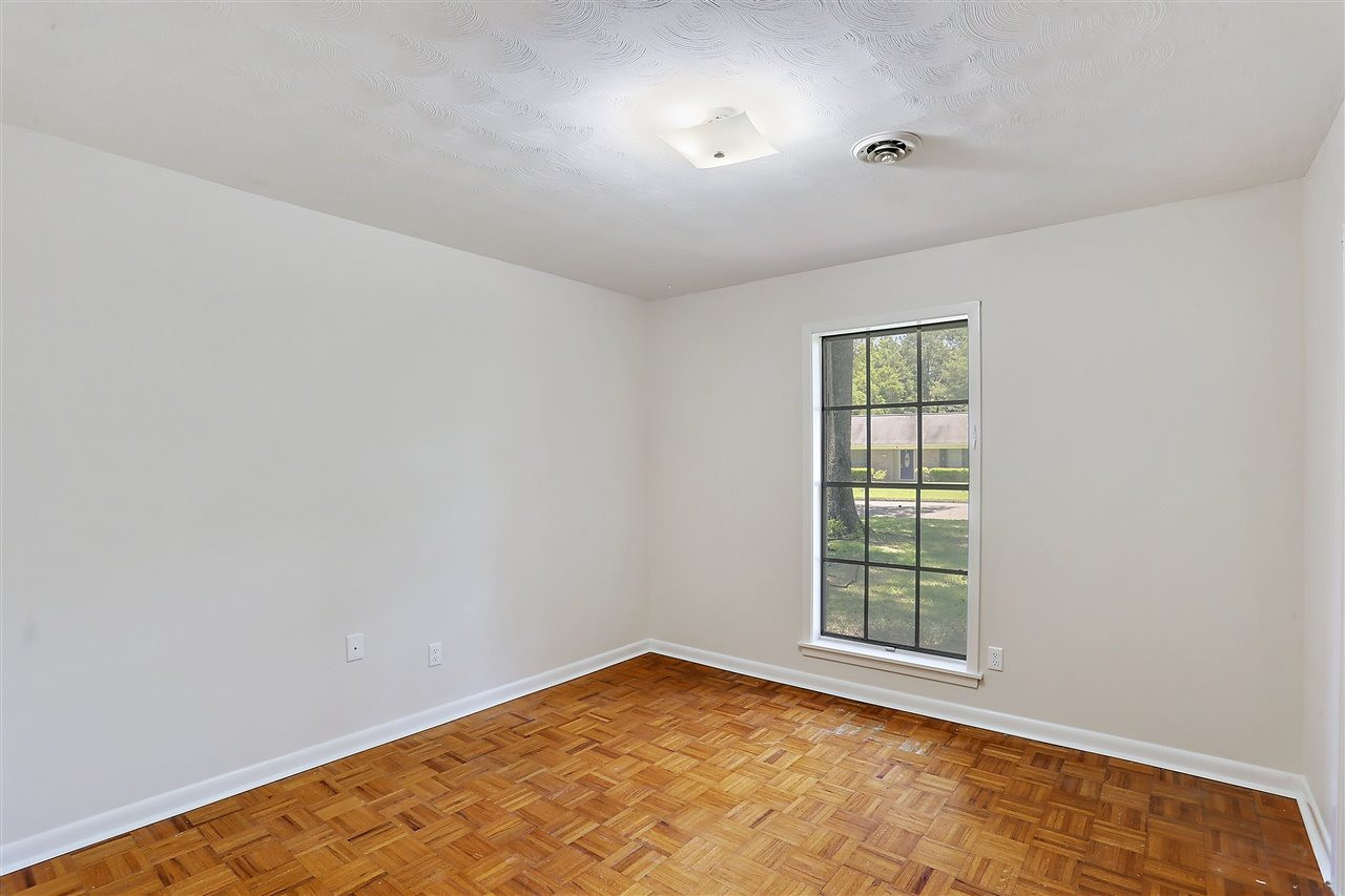 844 Timberlain Drive Jackson, MS 39211 - Photo 24 of 32 Original hardwood parquet in 2 bedrooms