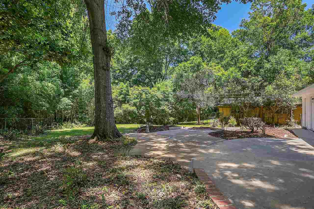 844 Timberlain Drive Jackson, MS 39211 - Photo 31 of 32 Backyard is partially fenced