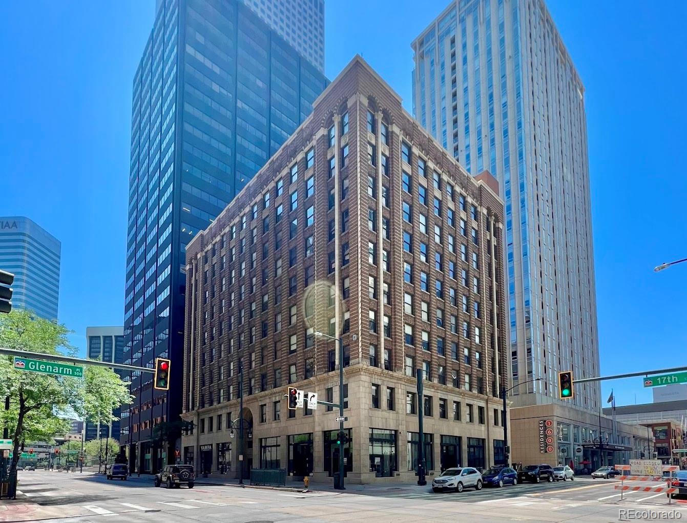 a view of a building with a street