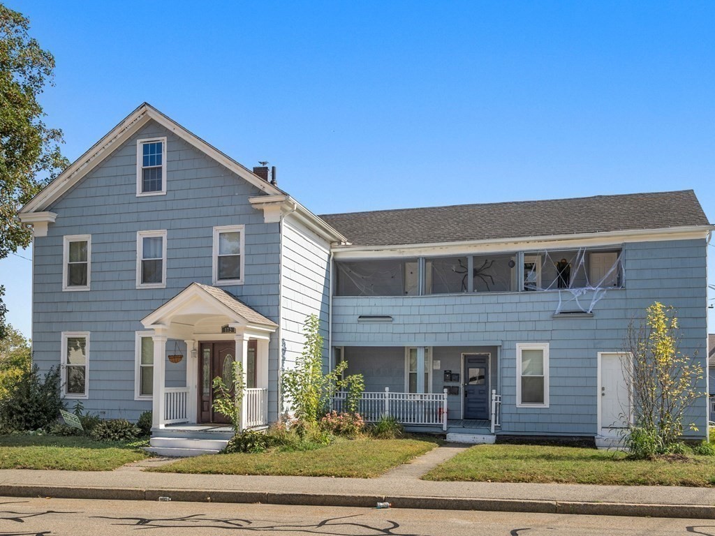 173 School Street Webster, MA 01570 - Photo 2 of 26 a front view of a house with a yard