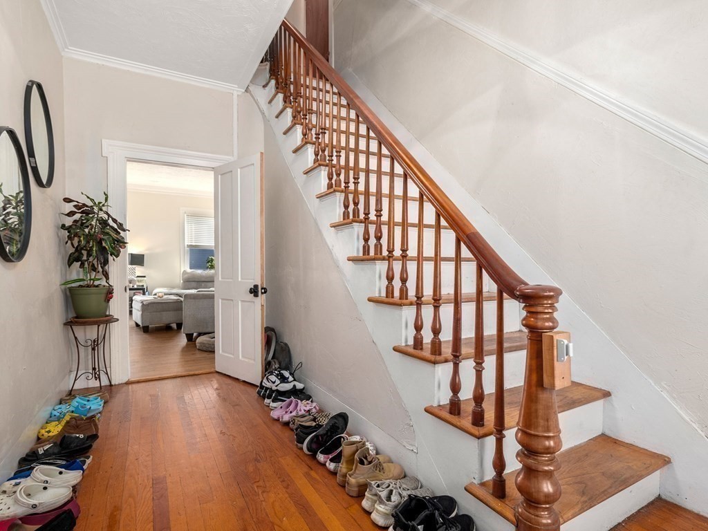 173 School Street Webster, MA 01570 - Photo 21 of 26 a view of entryway livingroom and hall with wooden floor
