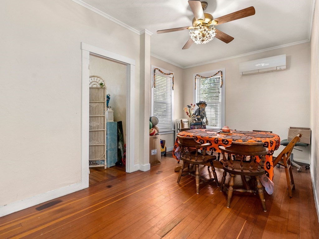 173 School Street Webster, MA 01570 - Photo 22 of 26 a dining room with furniture and wooden floor