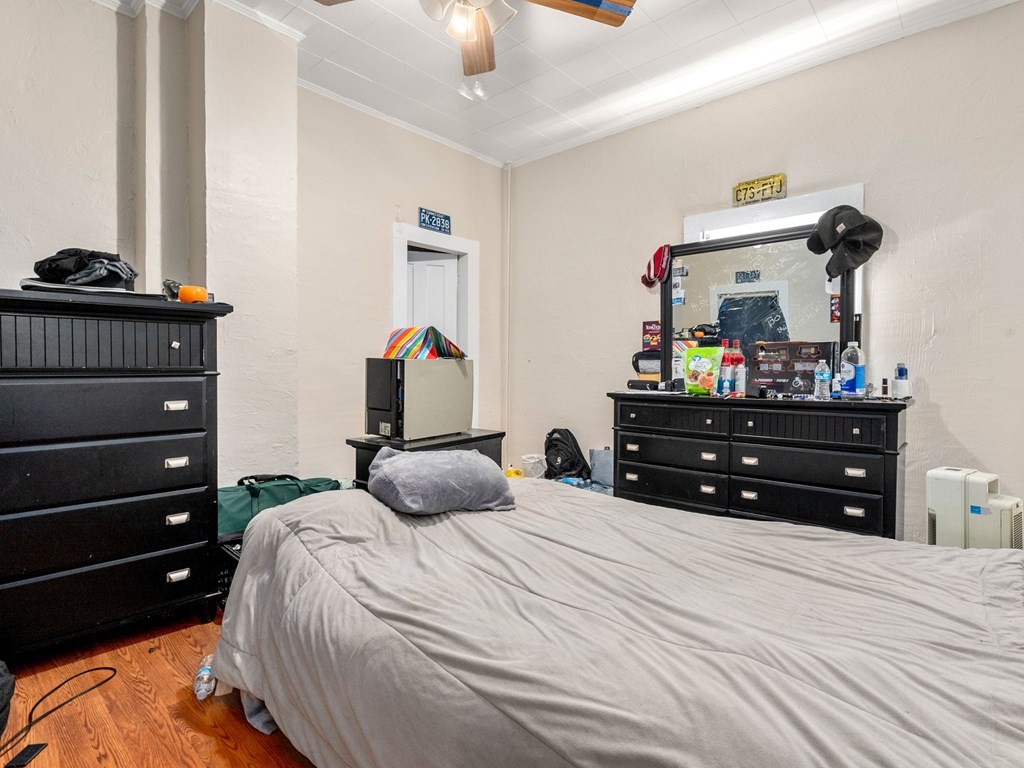 173 School Street Webster, MA 01570 - Photo 26 of 26 a bedroom with a bed and a dresser