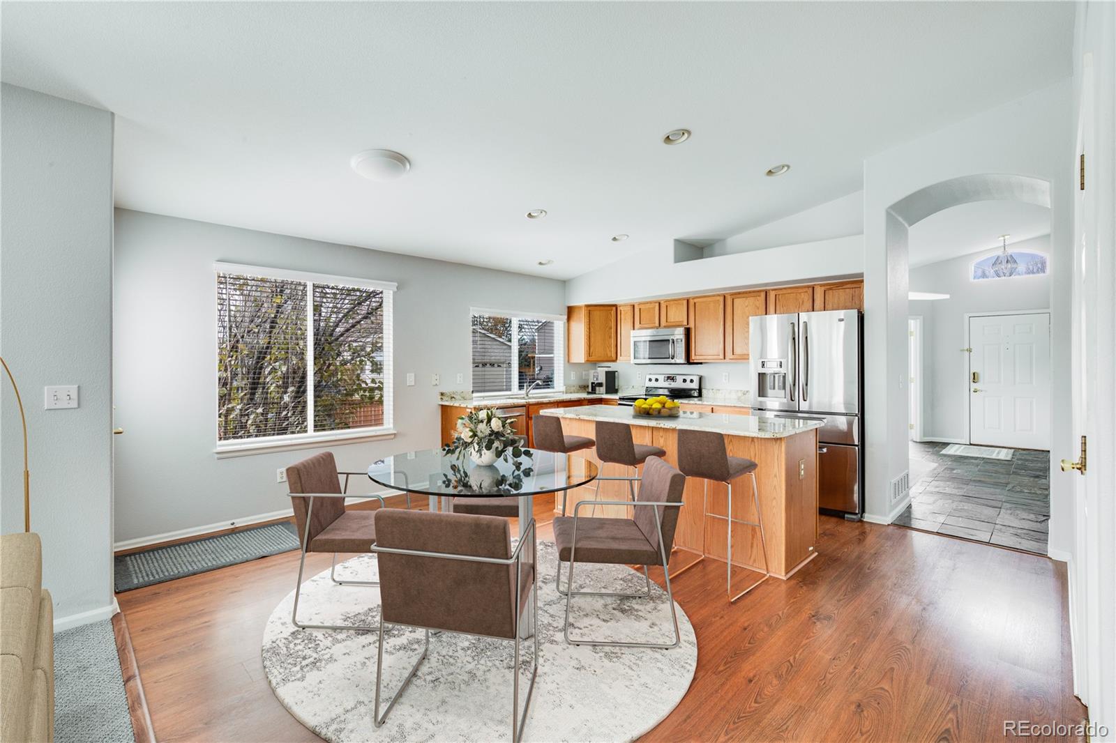 7135 Leopard Drive Lone Tree, CO 80124 - Photo 26 of 47 a living room with furniture and a large window