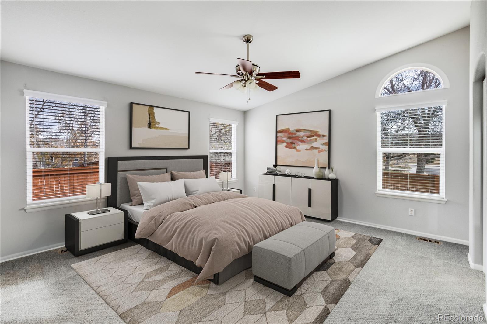 7135 Leopard Drive Lone Tree, CO 80124 - Photo 4 of 47 a bedroom with furniture and windows