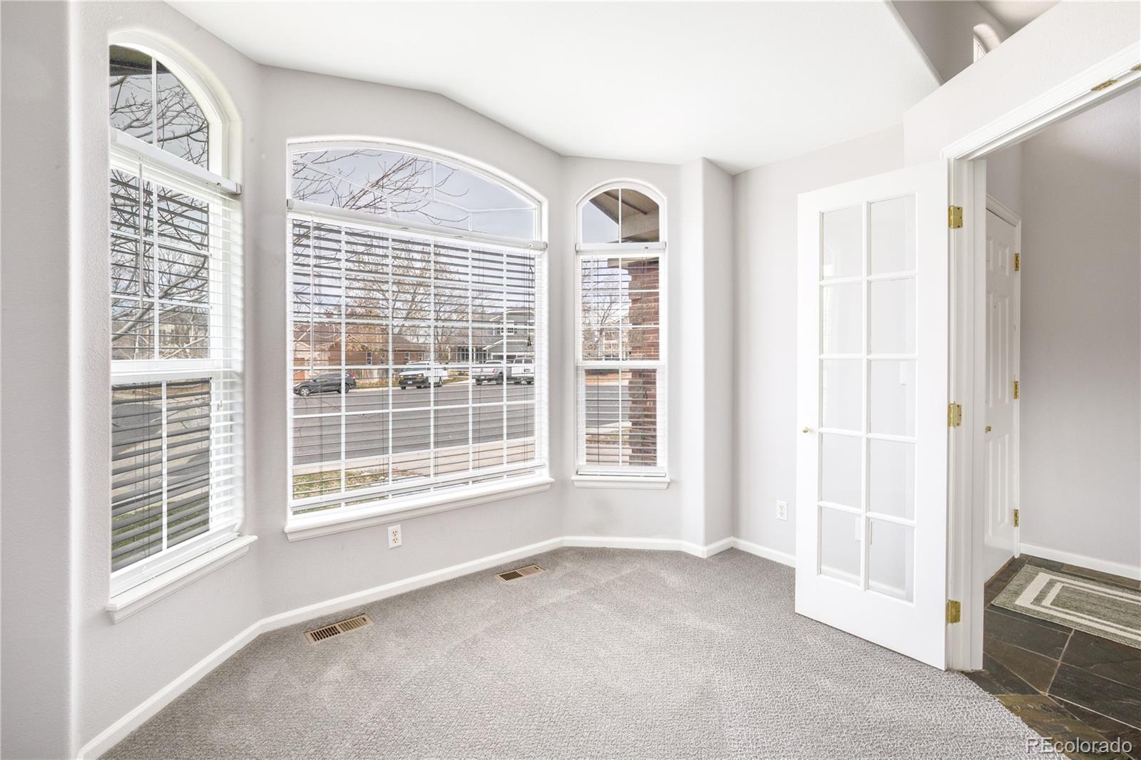 7135 Leopard Drive Lone Tree, CO 80124 - Photo 46 of 47 a view of an empty room with a window
