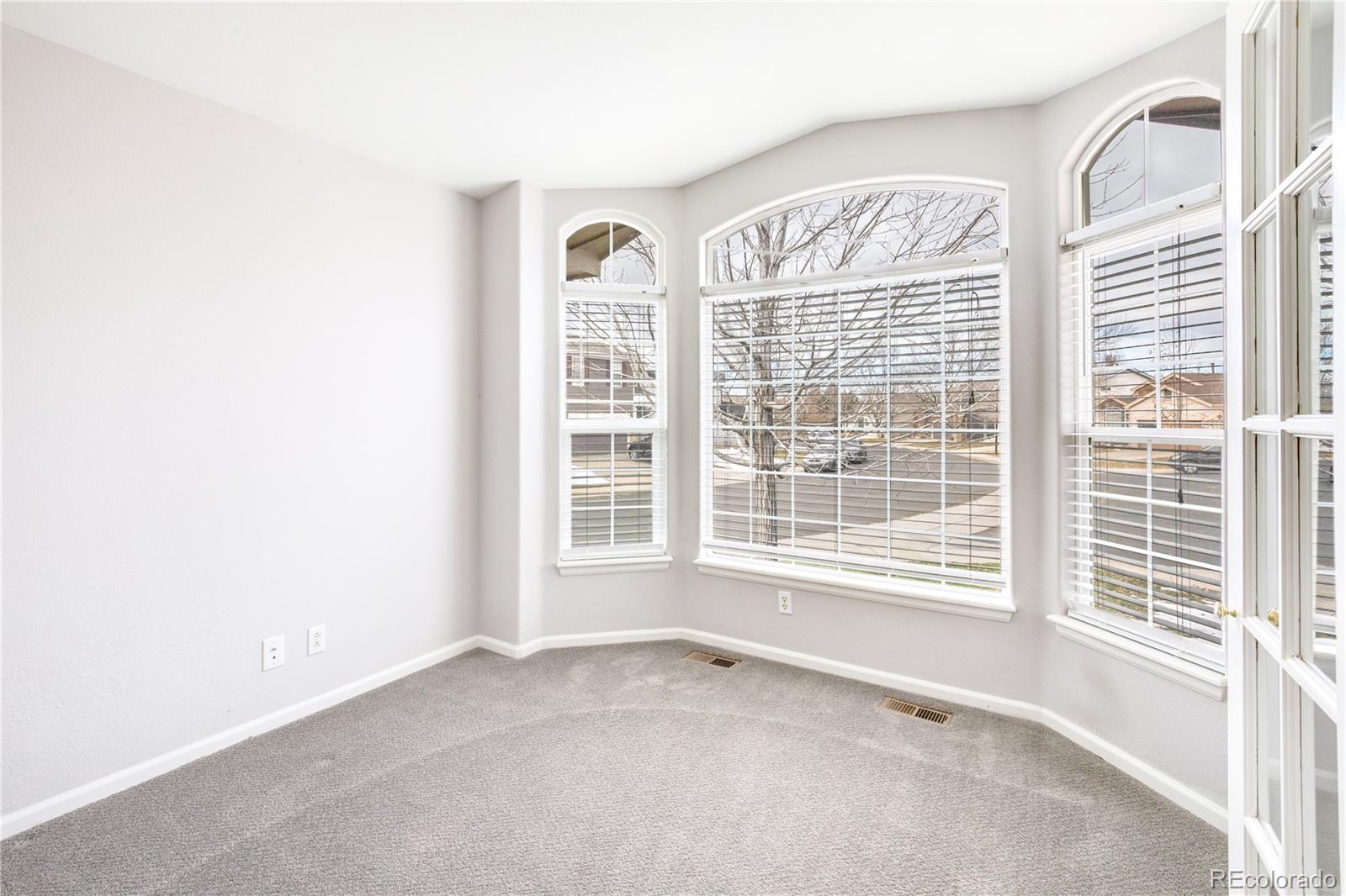 7135 Leopard Drive Lone Tree, CO 80124 - Photo 47 of 47 a view of an empty room with a window