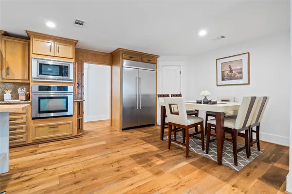a view of a dining room with furniture