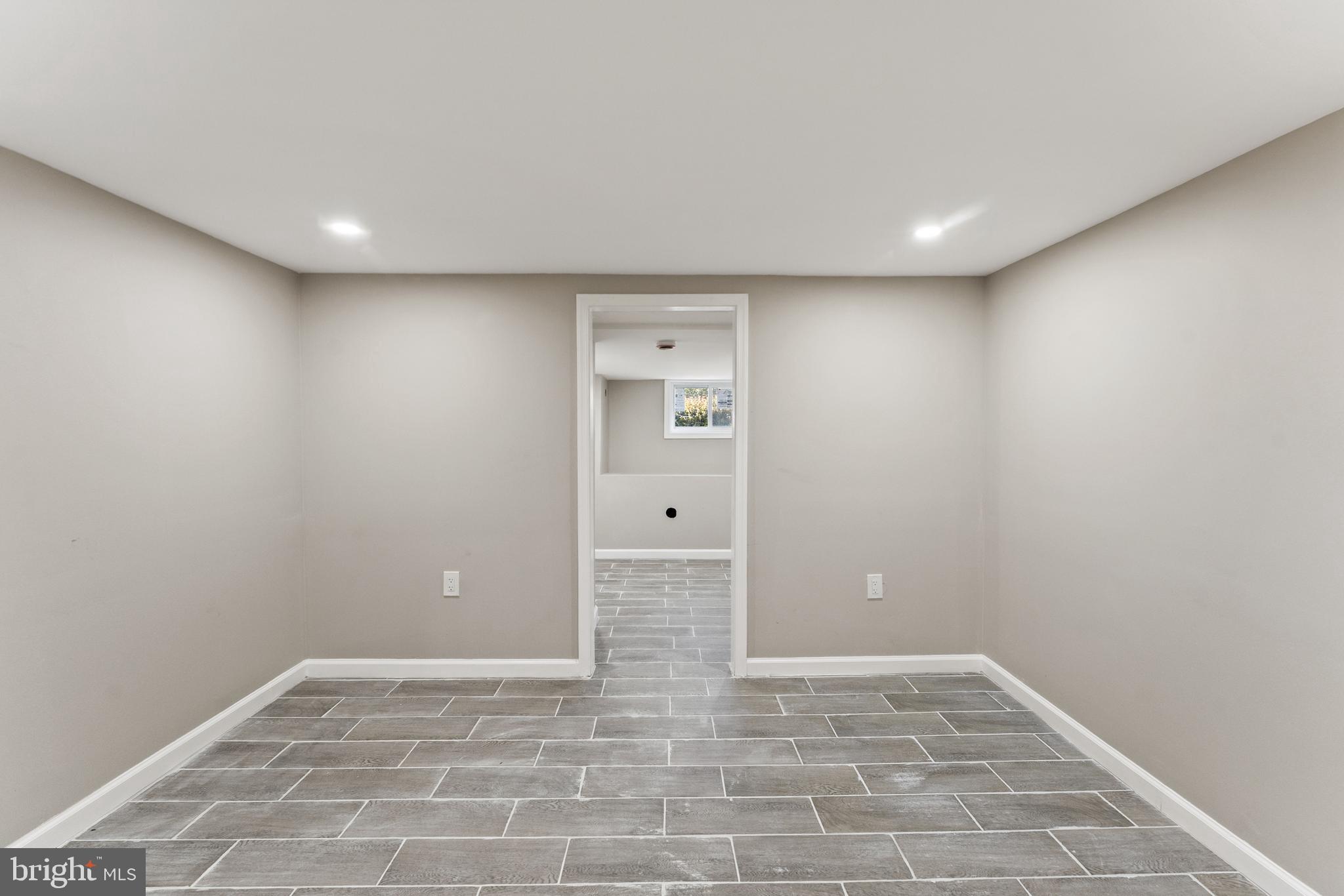 602 Denison Street Baltimore, MD 21229 - Photo 10 of 17 a view of an empty room