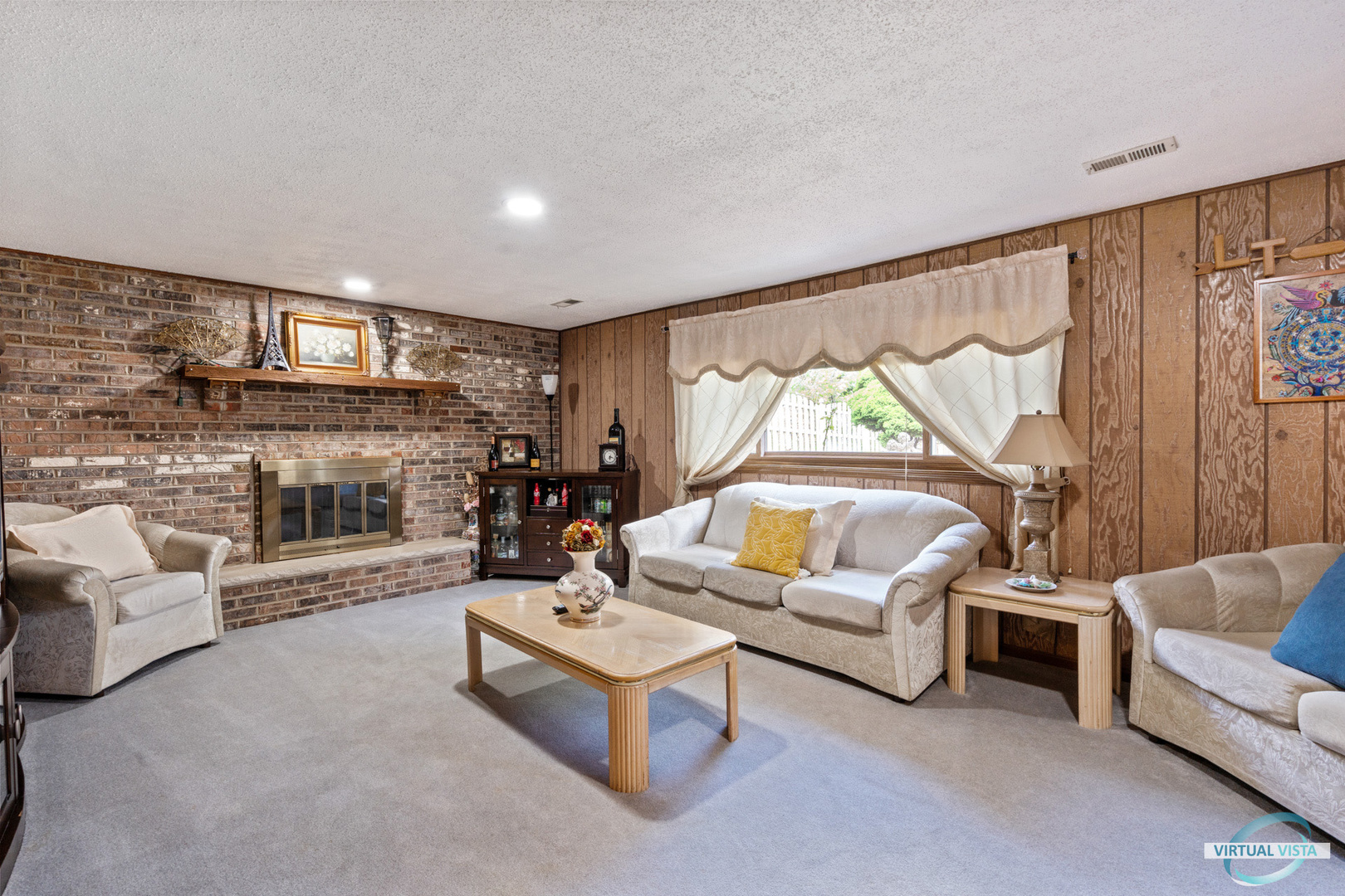 19205 Ada Street Lansing, IL 60438 - Photo 10 of 15 a living room with fireplace furniture and a large window