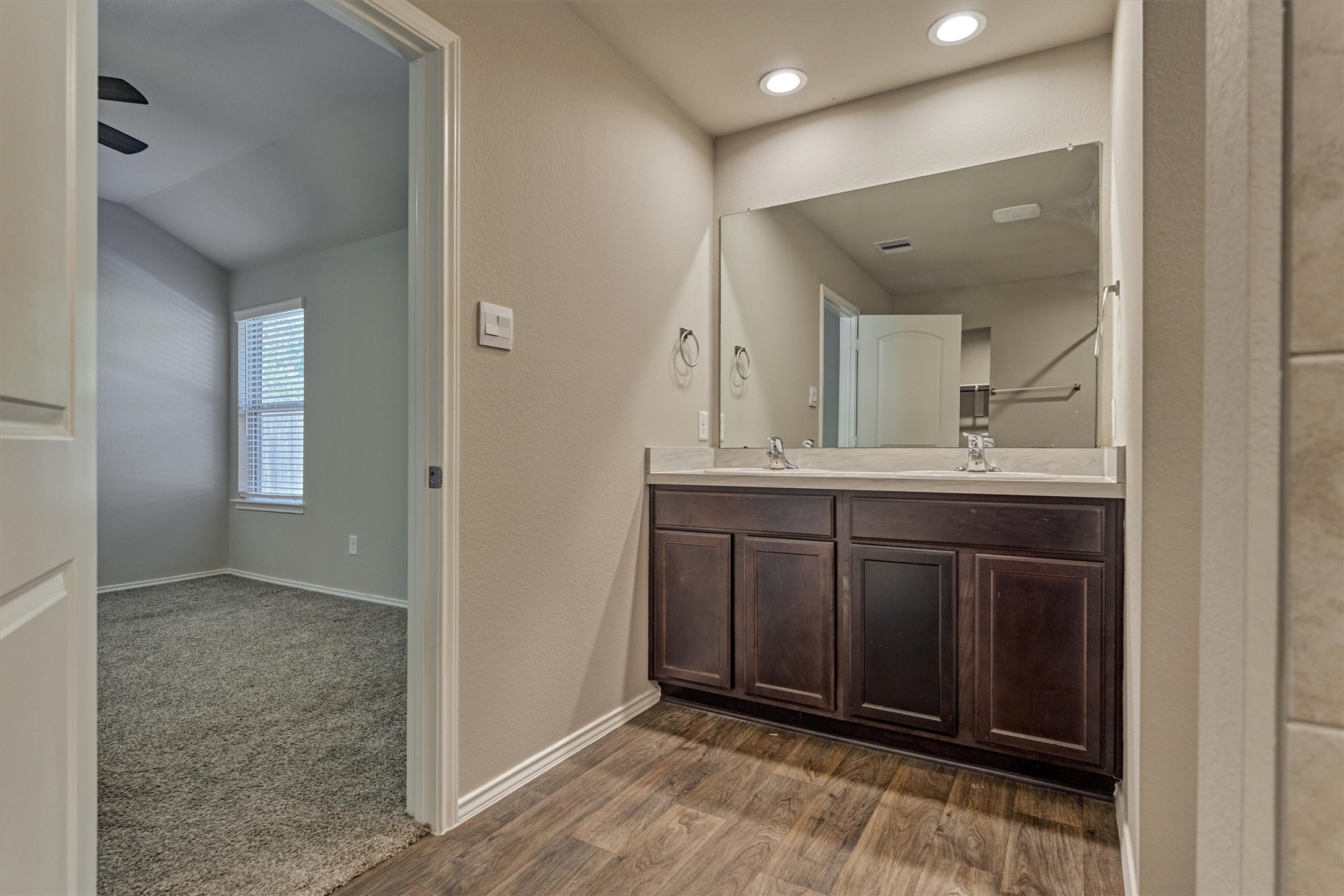 22630 Winter Maple Trail Spring, TX 77373 - Photo 20 of 31 a bathroom with a sink and a mirror