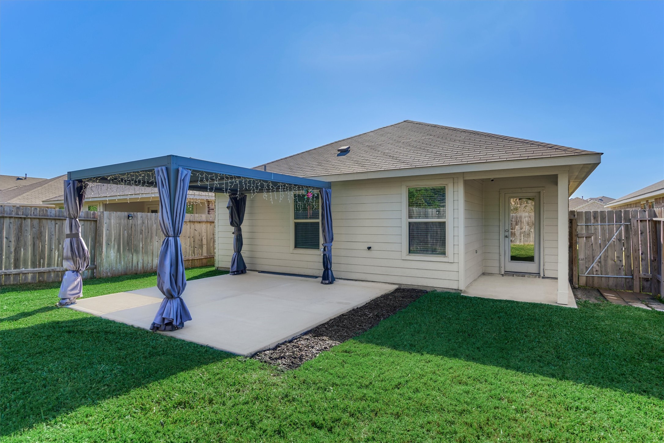 22630 Winter Maple Trail Spring, TX 77373 - Photo 31 of 31 a view of a house with yard and a garden