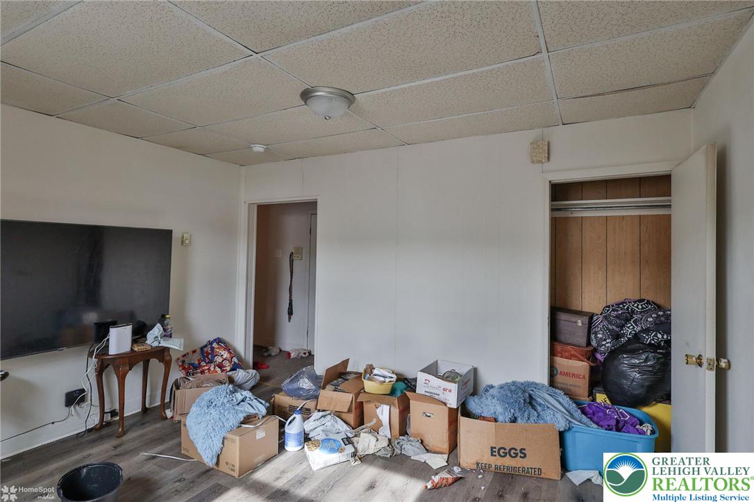 214 West Ridge Street Lansford, PA 18232 - Photo 16 of 52 a room with furniture and a chandelier fan