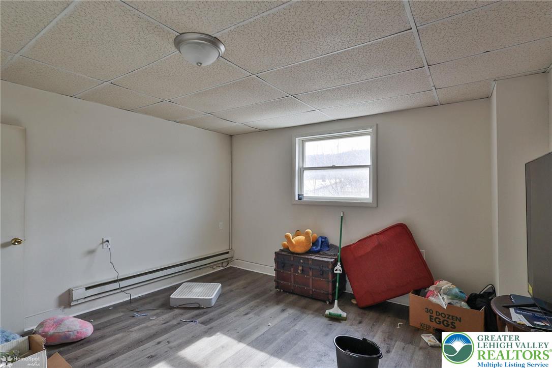 214 West Ridge Street Lansford, PA 18232 - Photo 25 of 52 a room with furniture and wooden floor