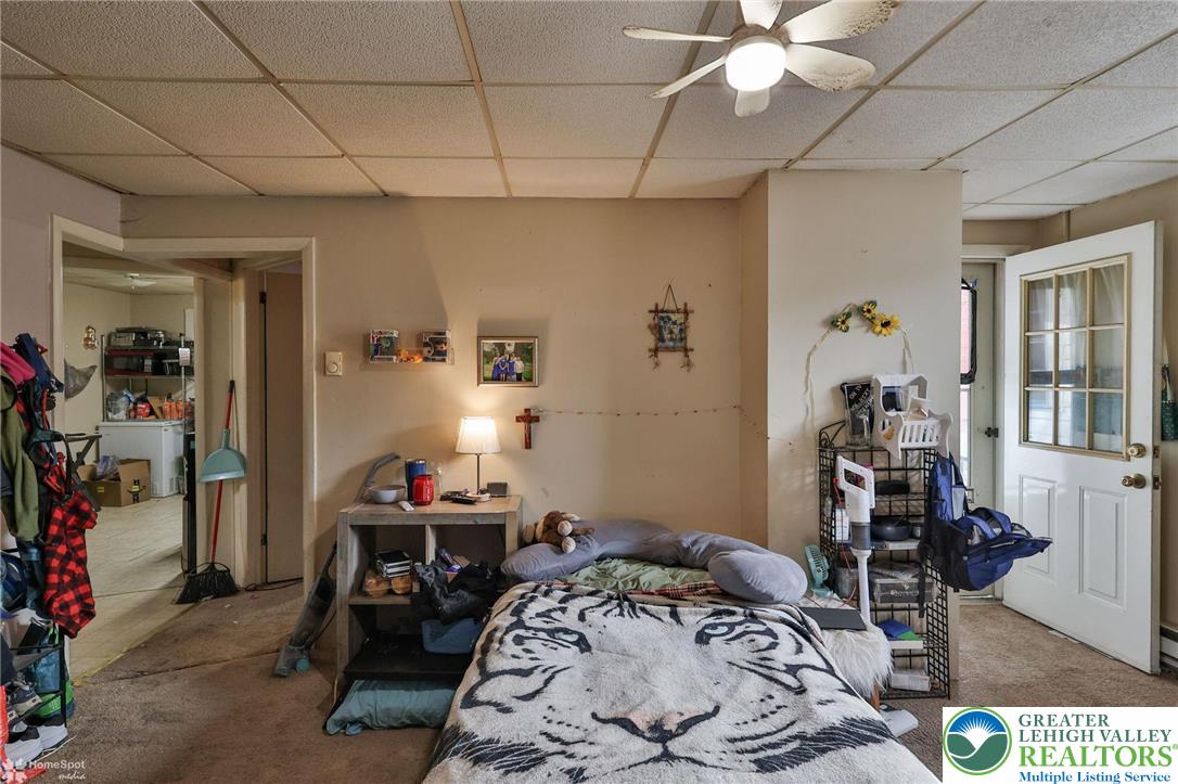 214 West Ridge Street Lansford, PA 18232 - Photo 30 of 52 a bedroom with a bed and wooden floor